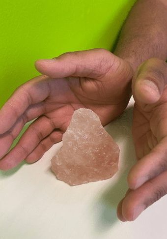 hands healing crystal